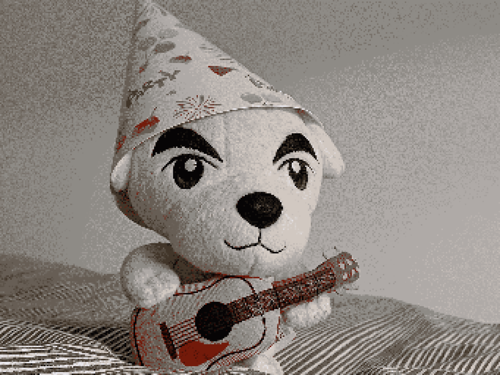 A KK Slider plush from Animal Crossing wearing a birthday hat.