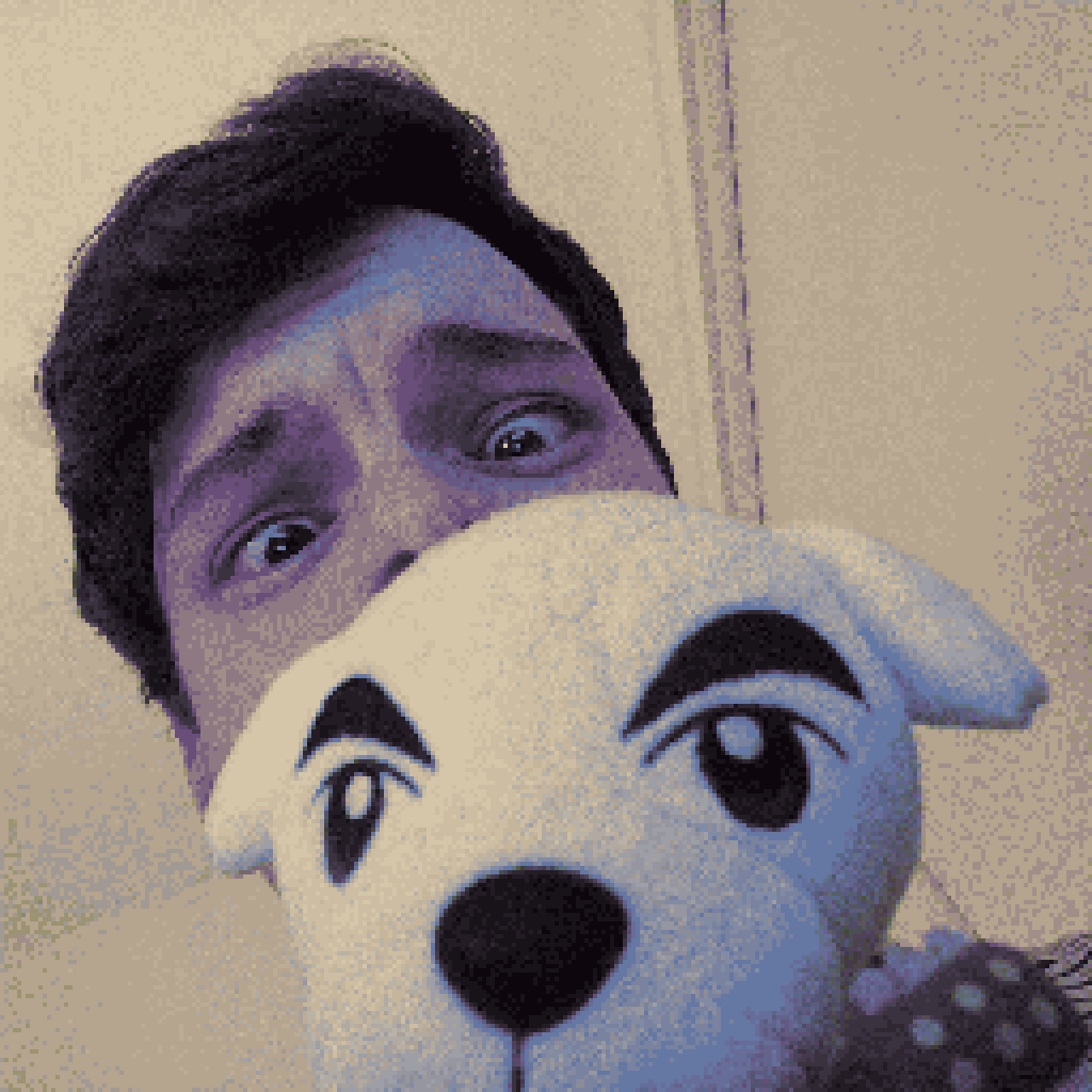 A close-up photo of my face with a KK Slider plush covering the bottom half. My expression is in shock.